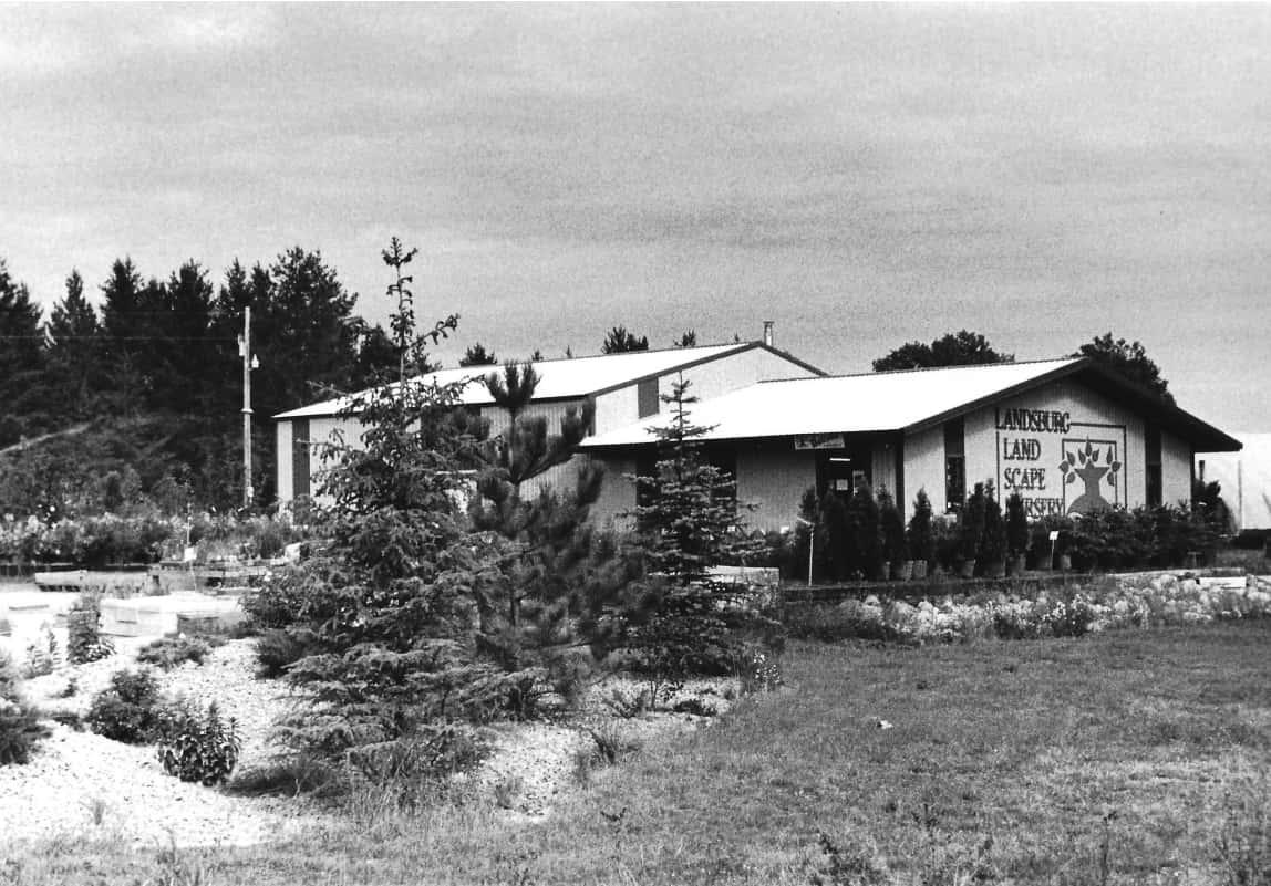 A black and white photo of the original Landsburg Landscape Nursery building.